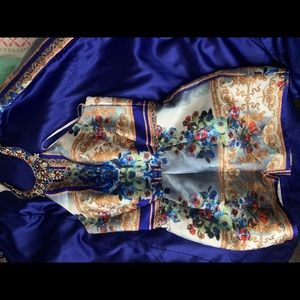 A 2018 Mac Duggal two piece prom dress. Worn once